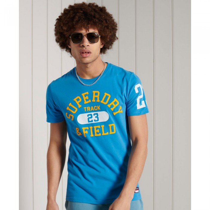 [해외]슈퍼드라이 Track&Field Graphic 185 반팔 티셔츠 137906106 Neptune Blue